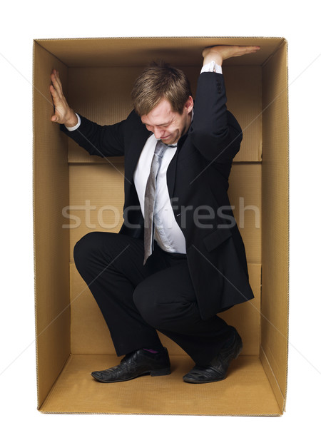 Heraus Geschäftsmann fest Karton isoliert Stock foto © gemenacom