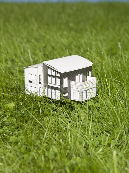 Miniatura casa fuori sole verde blu Foto d'archivio © gemenacom