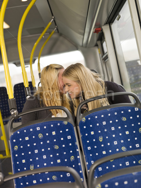 Donne bus due giovani donne segreti finestra Foto d'archivio © gemenacom