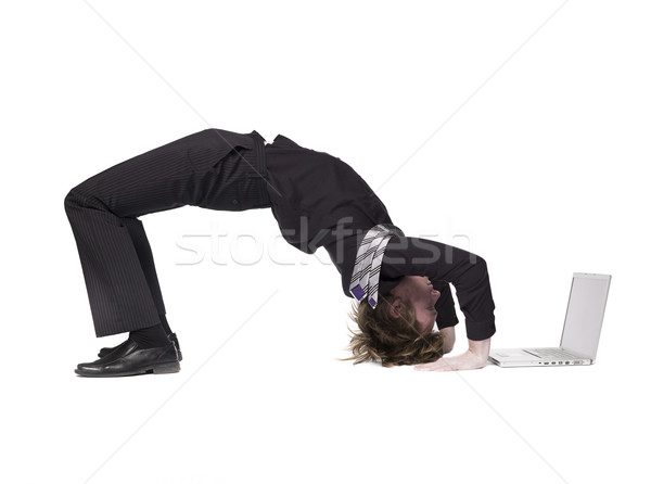Akrobatik adam bilgisayar beyaz kravat kişi Stok fotoğraf © gemenacom
