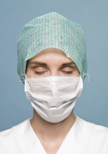 Nurse with her eyes closed Stock photo © gemenacom