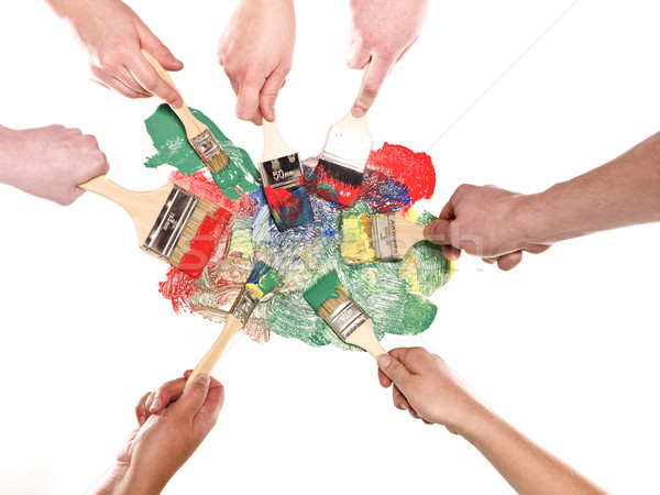 Seven hands with paintbrushes Stock photo © gemenacom