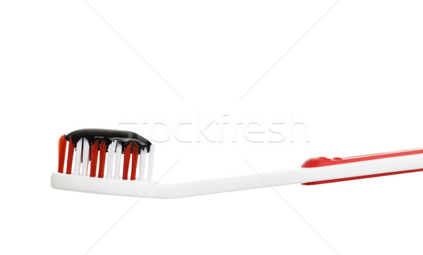 Toothbrush with chocolate sauce Stock photo © gemenacom