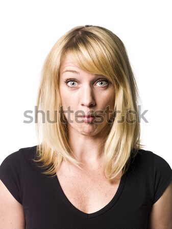 Blond woman making a funny face Stock photo © gemenacom