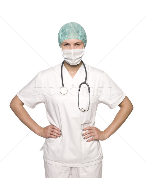 Female nurse towards white background Stock photo © gemenacom