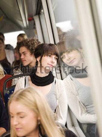 Olvas busz fiatal nő könyv nők idő Stock fotó © gemenacom