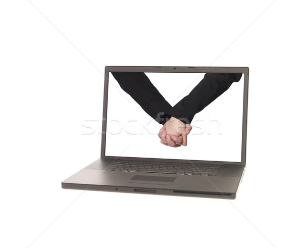 Laptop displaying two men holding hands Stock photo © gemenacom