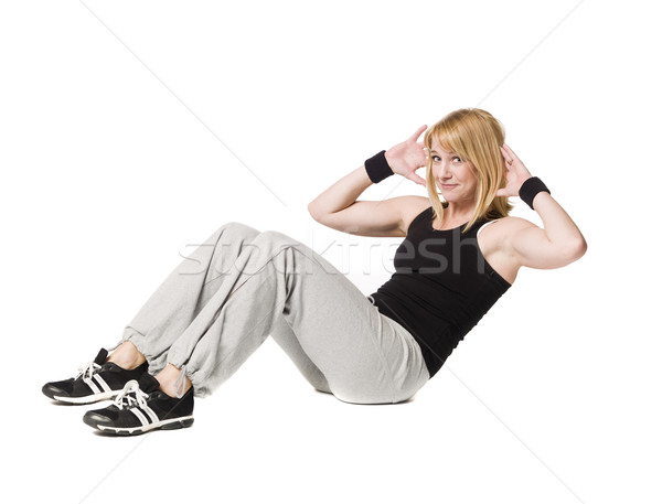 Woman doing situps Stock photo © gemenacom