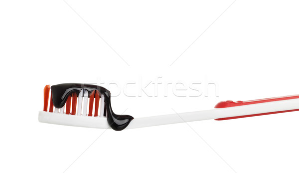 Toothbrush with chocolate sauce Stock photo © gemenacom