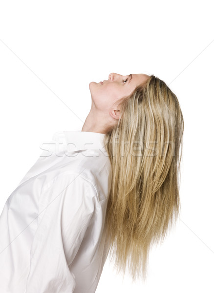 Portrait of a woman swinging her hair Stock photo © gemenacom