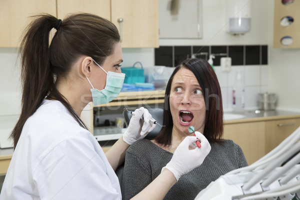 Félő nő fogorvos nők beteg makró Stock fotó © gemenacom