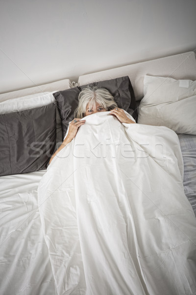 Félő nő egyedül hálószoba nők női Stock fotó © gemenacom