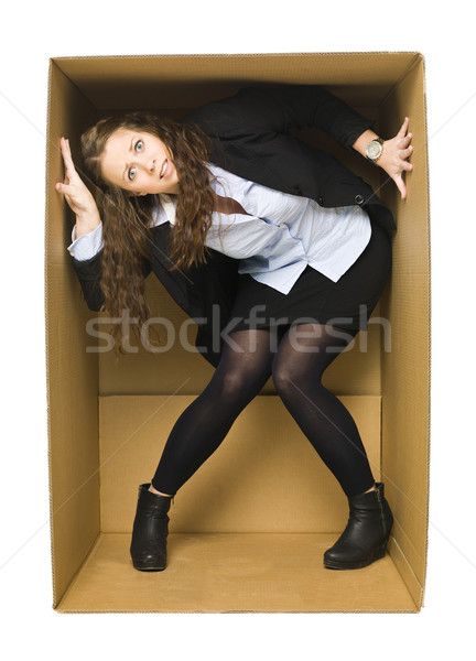 Stock photo: Woman in a Carboard Box