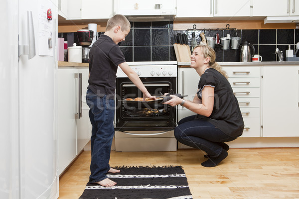 Mother and son in kitchen Stock photo © gemenacom