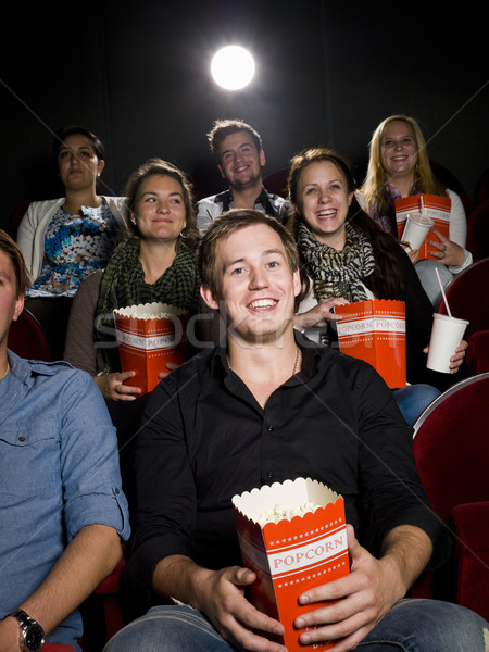 Férfi mozi pattogatott kukorica fiatalember film színház Stock fotó © gemenacom