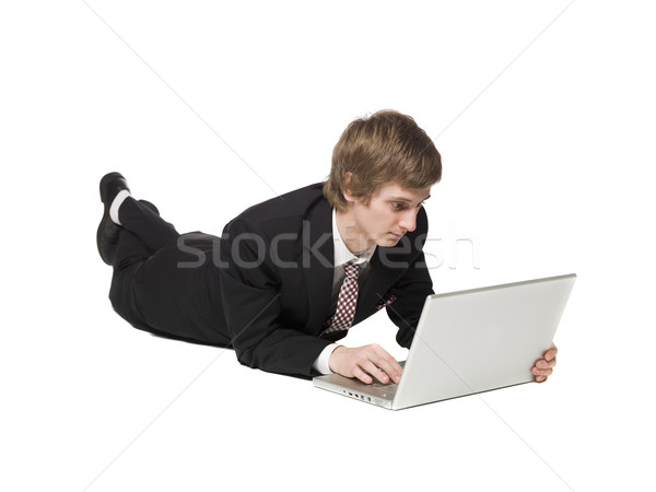 Man on the floor with a computer Stock photo © gemenacom