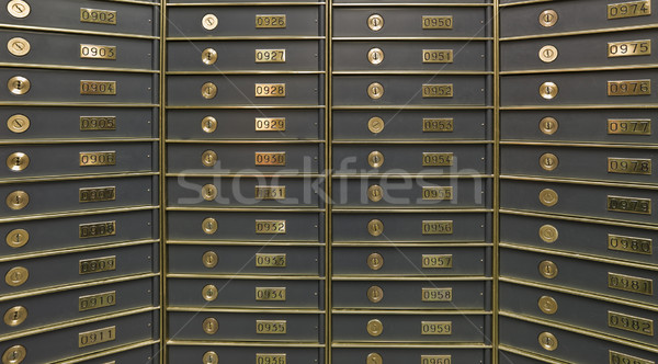 Stock photo: Rows of luxurious safe deposit boxes