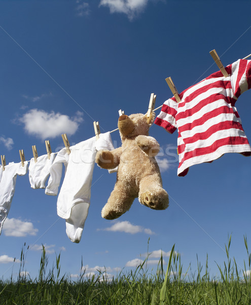 Baby clothing on a clothesline Stock photo © gemenacom