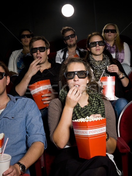 Eating popcorn at the cinema Stock photo © gemenacom