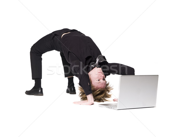 Acrobático hombre ordenador blanco empate persona Foto stock © gemenacom