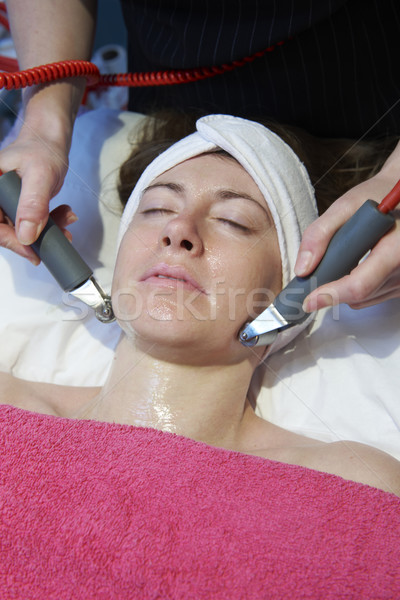 Tratamiento mujer estimulante cara mujeres belleza Foto stock © gemphoto