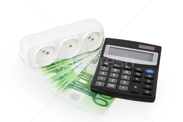 power socket money and a calculator Stock photo © GeniusKp