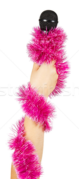 Female hand with pink garland holding a microphone Stock photo © GeniusKp