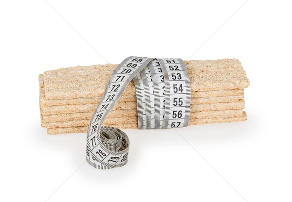 Diet breads with measuring tape Stock photo © GeniusKp