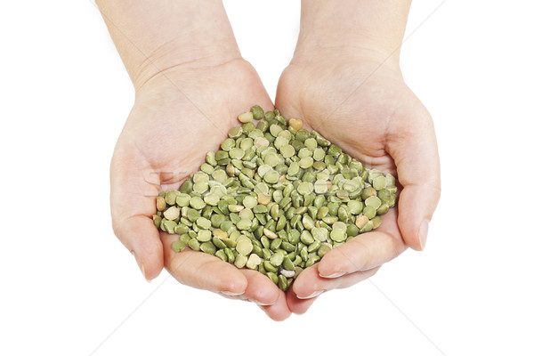 Hands holding a green dried peas Stock photo © GeniusKp