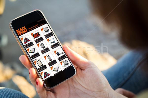 Nő ül utca vásárlás online okostelefon Stock fotó © georgejmclittle