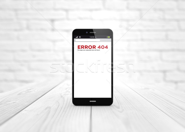 smart phone over wooden table error 404 Stock photo © georgejmclittle