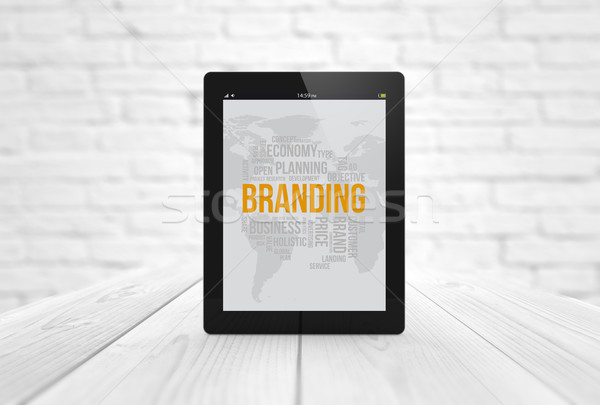 branding tablet on wooden table Stock photo © georgejmclittle