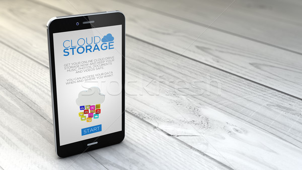 smartphone cloud drive over white wooden background Stock photo © georgejmclittle