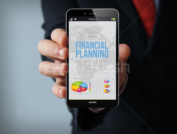 финансовое планирование бизнесмен смартфон новых бизнеса Сток-фото © georgejmclittle