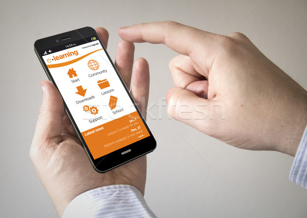  touchscreen smartphone with e-learning site on the screen Stock photo © georgejmclittle