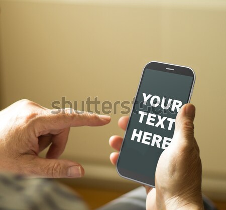 Portrait of a mature man calling emergencies number in a mobile  Stock photo © georgejmclittle