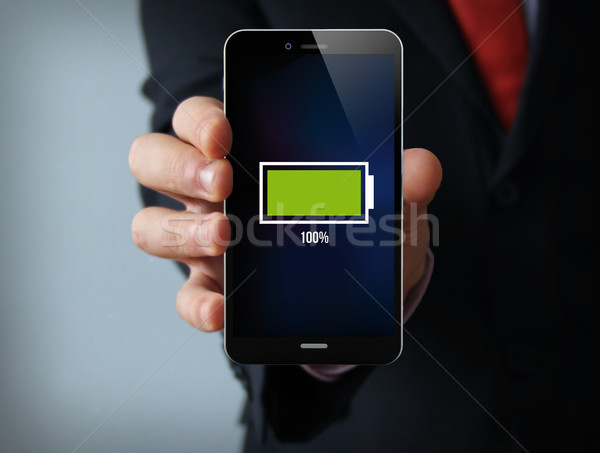Vol batterij zakenman smartphone nieuwe Stockfoto © georgejmclittle