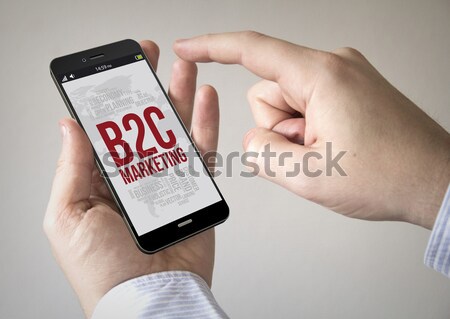 Portrait of a mature man calling emergencies number in a mobile  Stock photo © georgejmclittle