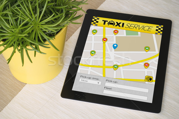 Tablet taxi app tavola impianto tutti Foto d'archivio © georgejmclittle