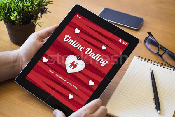 desktop tablet online dating Stock photo © georgejmclittle