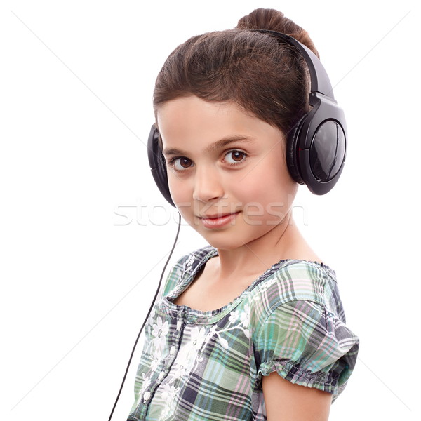 Escuta algo jovem bonitinho menina fones de ouvido Foto stock © georgemuresan