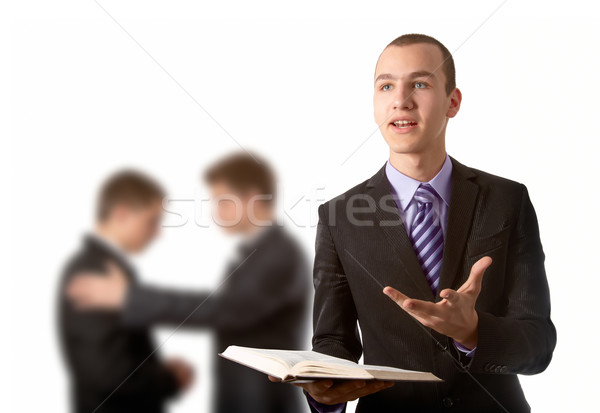 Verkündigung junger Mann andere zwei beten Buch Stock foto © georgemuresan