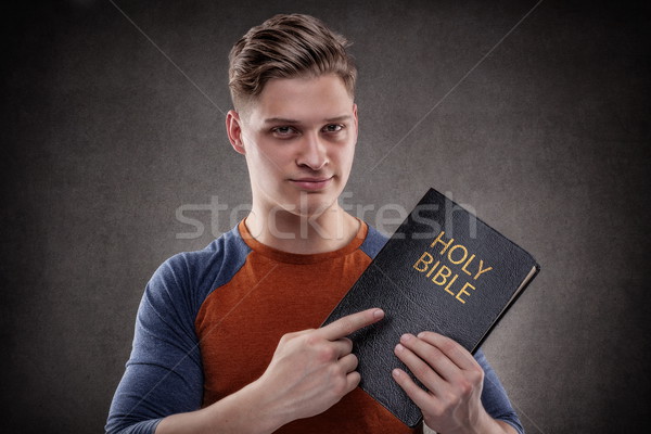 Pointing to the Book of Life Stock photo © georgemuresan