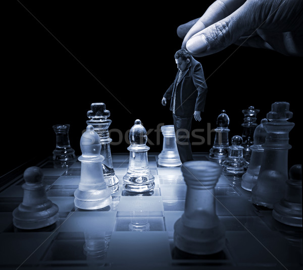 Businessman on a chessboard as a dummy Stock photo © Geribody