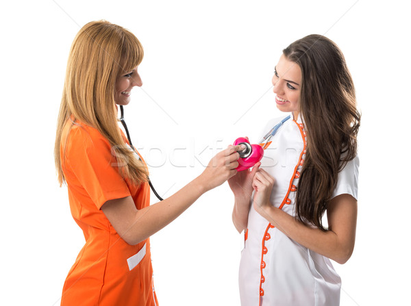 Foto stock: Dos · uno · enfermera · otro · corazón