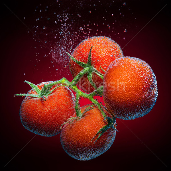 Tomatoes with bubbles Stock photo © Geribody