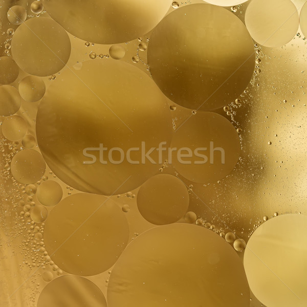 Stock photo: Gold,beige,brown Gradient Oil drops in the water -abstract background