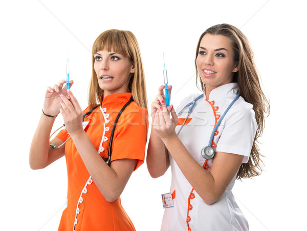 Foto stock: Dos · enfermera · mano · inyección · médico · feliz