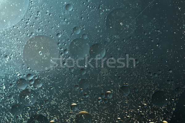 Oil drops grayish blue, in the water -abstract background  Stock photo © Geribody