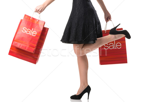 Stock photo: Pretty woman and  sale, detail photo, female legs with sale bags